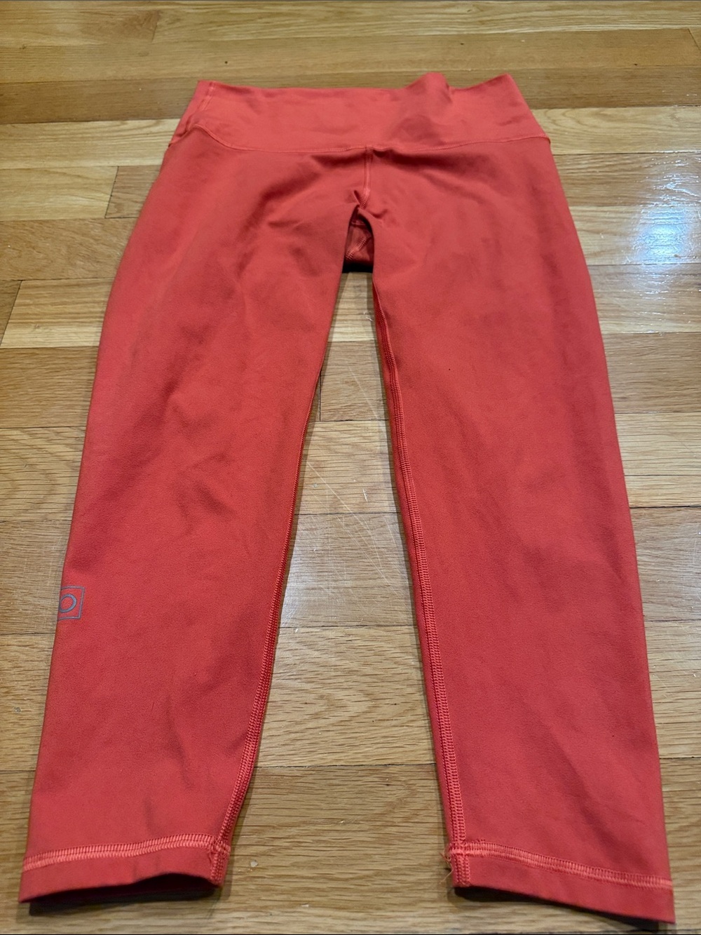 Fleo orange leggings size large .
